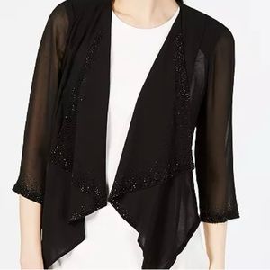 Calvin Klein cardigan, cover up, shrug top beautiful sleeves front rhinestones.